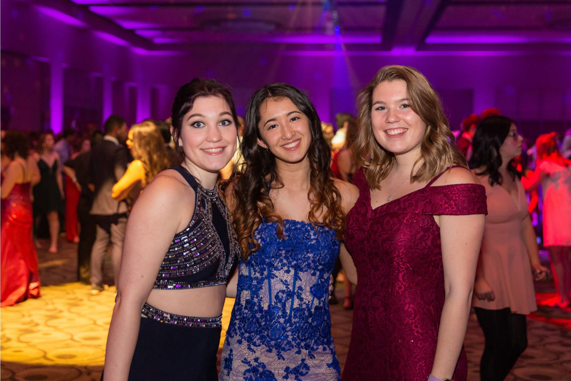 3 girls at president's ball smiling